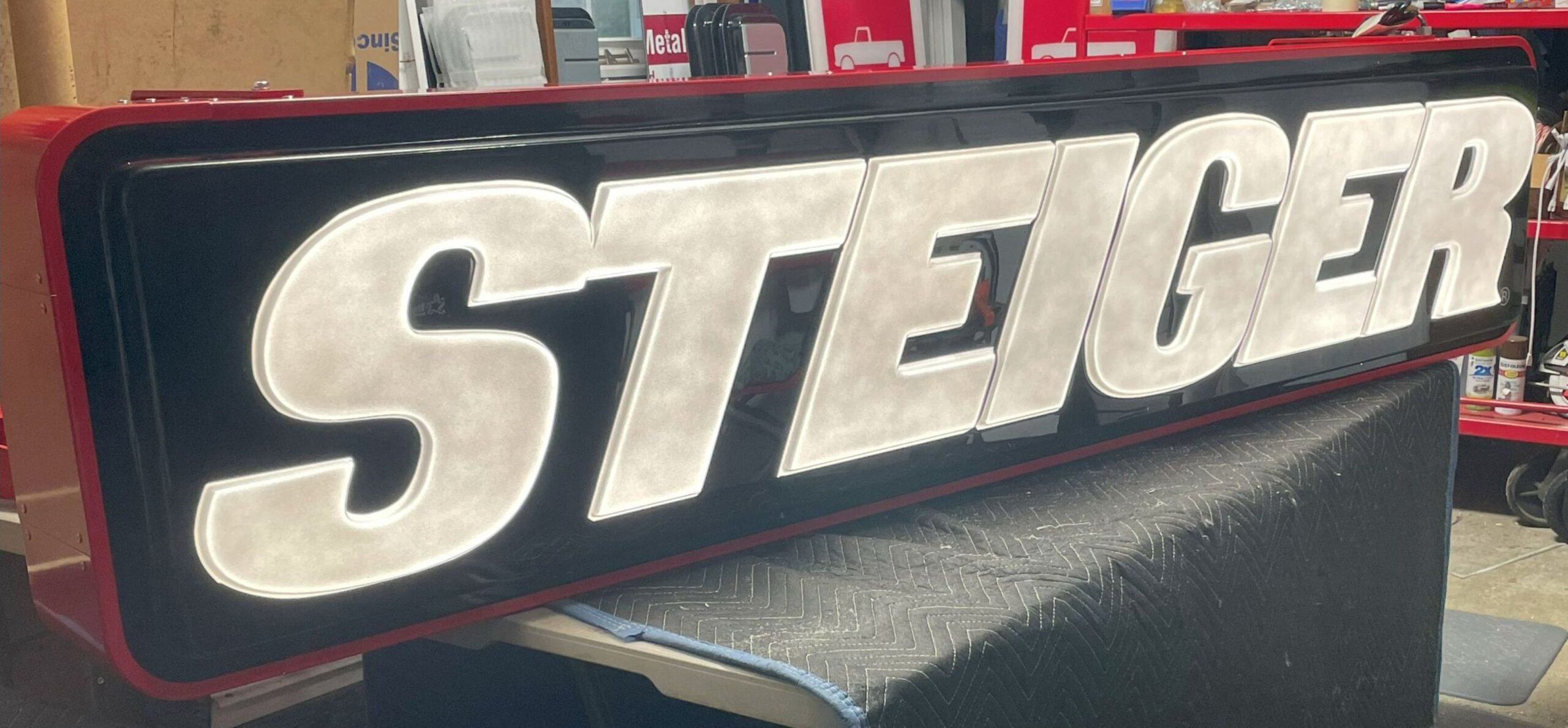 21” x 96” Red STEIGER Sign - Image 8