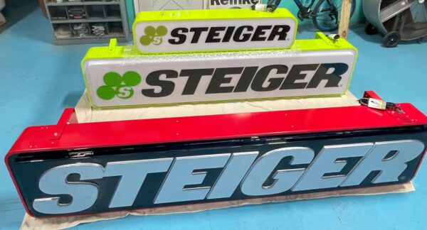 21” x 96” Green STEIGER Sign | Custom Farm Signs | That Emblem Guy ...