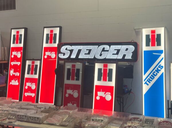21” x 96” Red STEIGER Sign | Custom Farm Signs | That Emblem Guy ...