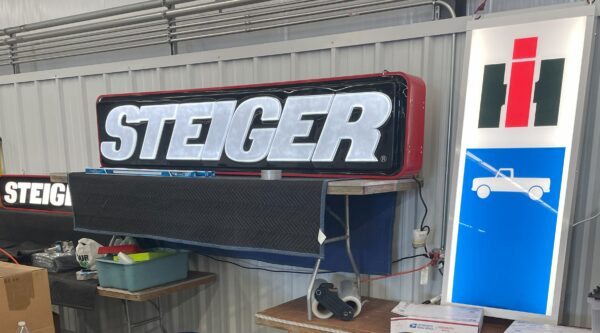 21” x 96” Red STEIGER Sign | Custom Farm Signs | That Emblem Guy ...