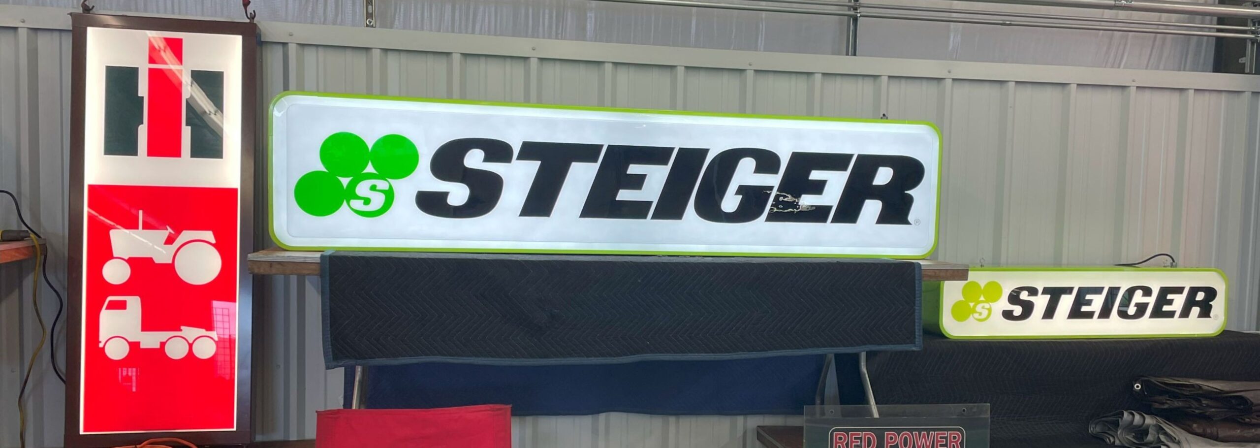 21” x 96” Green STEIGER Sign - Image 7